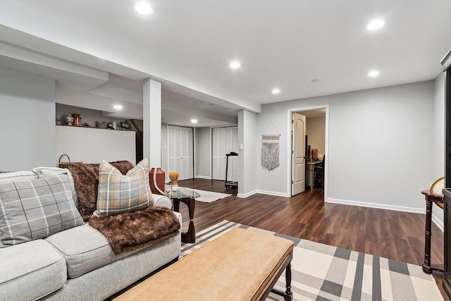 living room featuring dark wood-type flooring