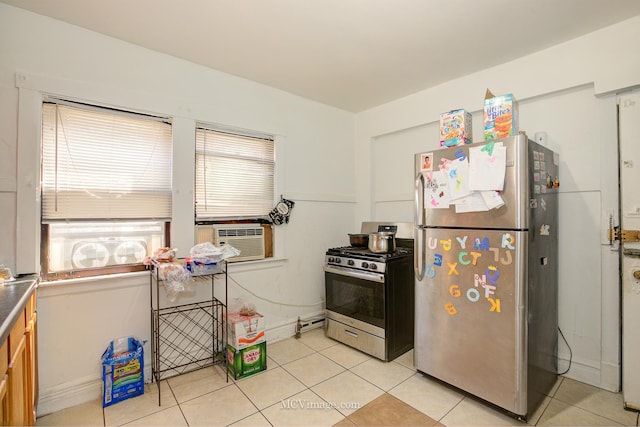 kitchen with light tile patterned floors, stainless steel appliances, and cooling unit