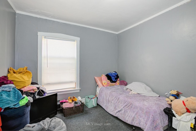 carpeted bedroom featuring ornamental molding