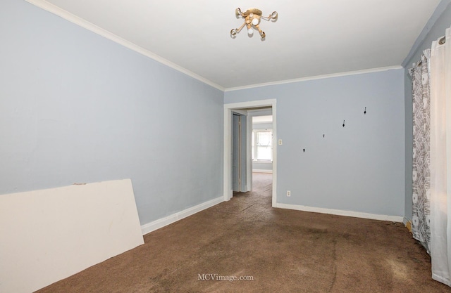 empty room with carpet and ornamental molding