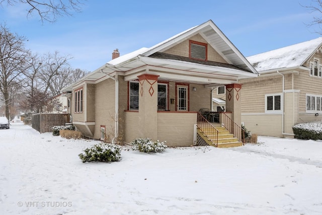 bungalow-style home with a porch