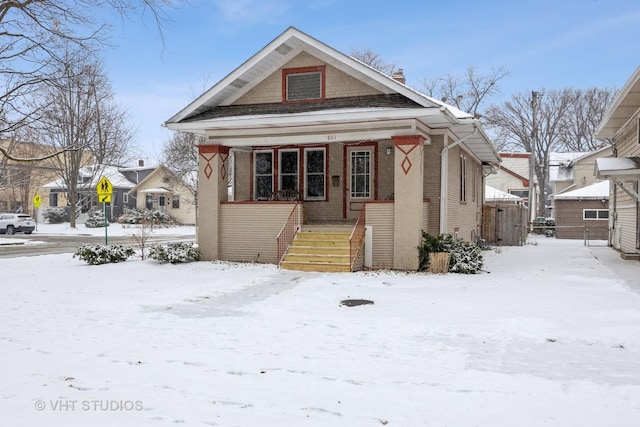 bungalow-style home with a porch