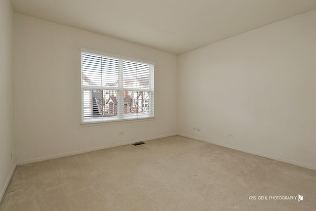 view of carpeted spare room