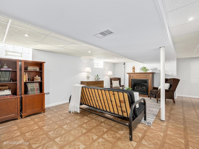 bedroom with a paneled ceiling