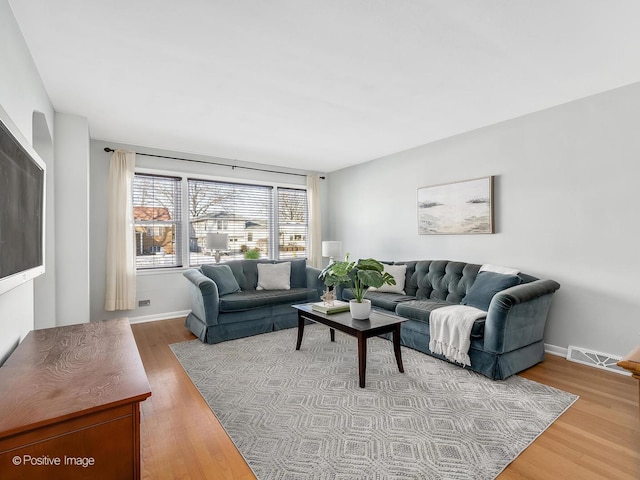 living room with light wood-type flooring