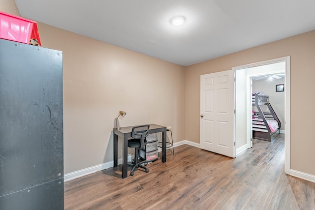 office space with hardwood / wood-style flooring