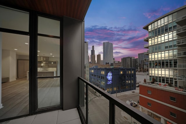 view of balcony at dusk