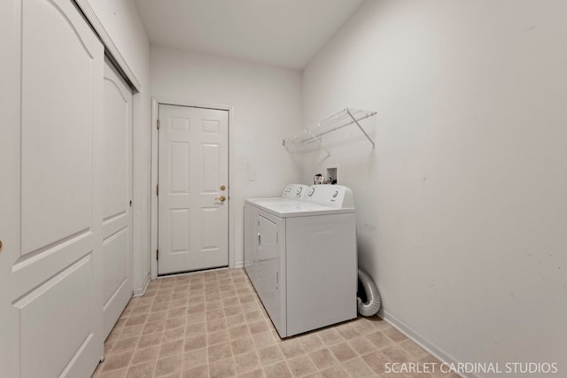 laundry area featuring washing machine and dryer