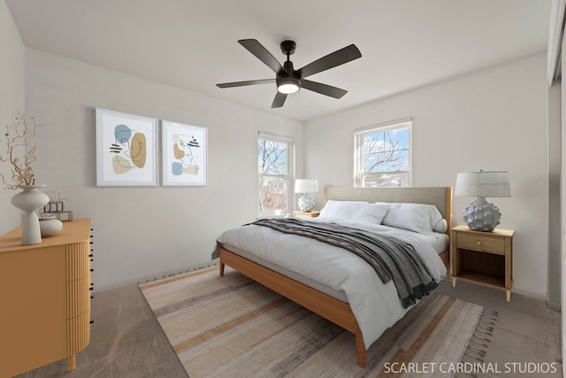 bedroom featuring ceiling fan and carpet floors