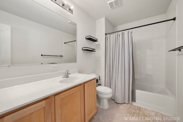 full bathroom featuring vanity, shower / tub combo, and toilet