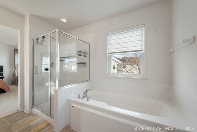 bathroom with plus walk in shower and tile patterned floors