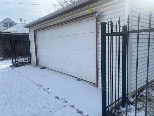 view of snow covered garage