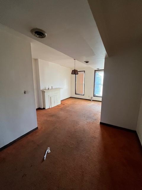 additional living space with carpet floors