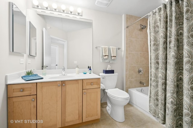 full bathroom with tile patterned flooring, vanity, shower / bath combo, and toilet