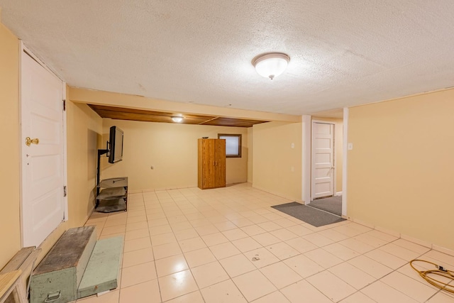 basement featuring electric panel, light tile patterned floors, and wooden ceiling