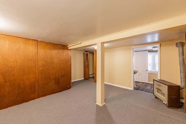 basement featuring carpet flooring