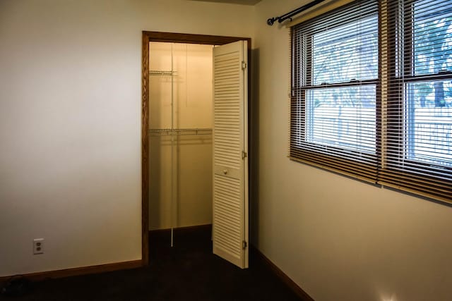 unfurnished bedroom featuring a closet