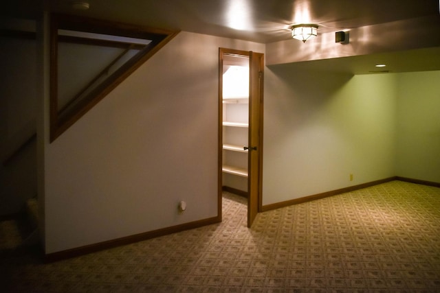 additional living space with light colored carpet