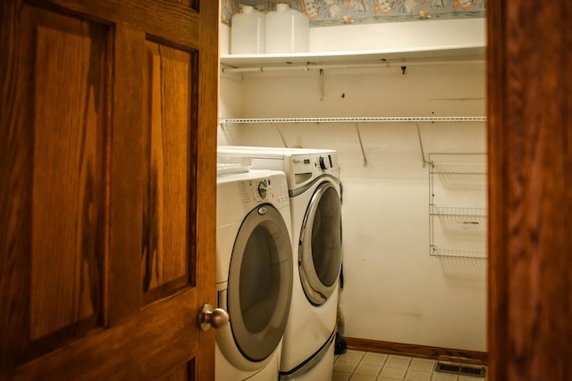 laundry room with washer and dryer