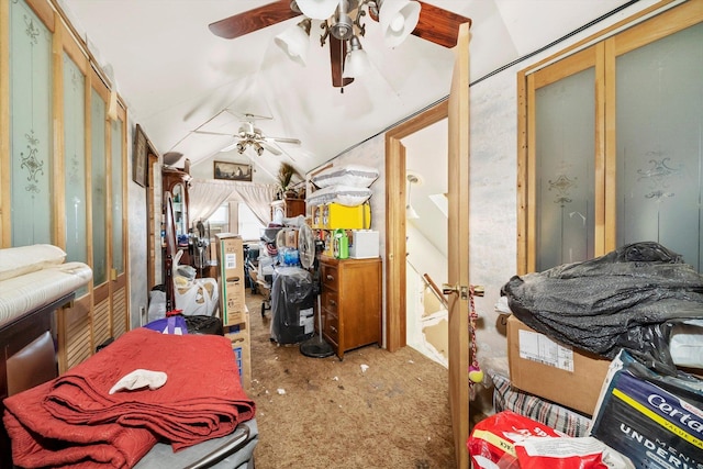 misc room with carpet flooring, ceiling fan, and lofted ceiling