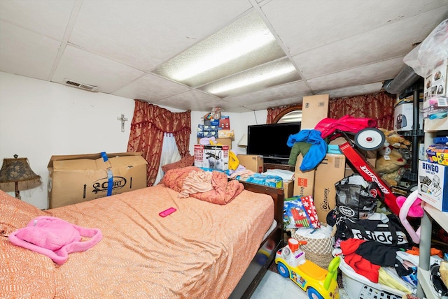 bedroom with a drop ceiling