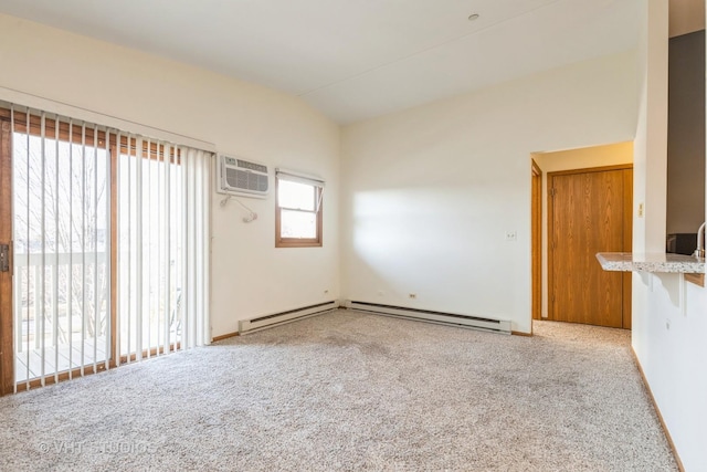 carpeted empty room with a wall mounted air conditioner, a baseboard radiator, and vaulted ceiling