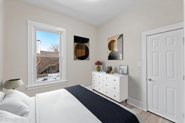 bedroom featuring light hardwood / wood-style flooring