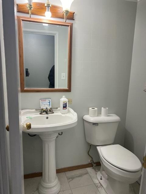 bathroom featuring toilet