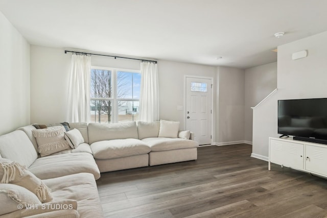 living room with dark hardwood / wood-style floors