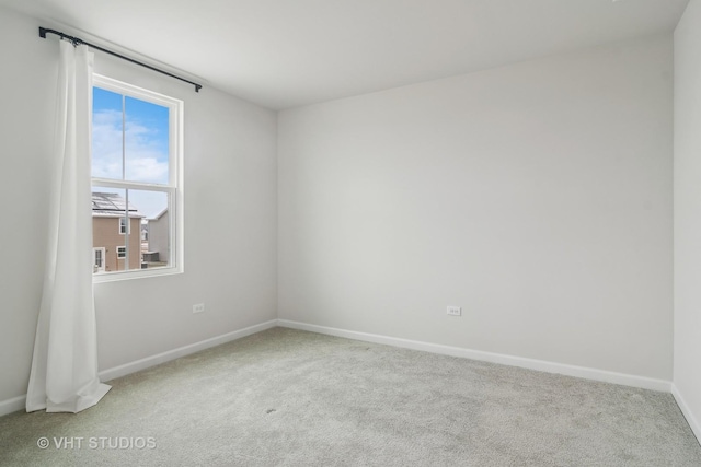 empty room featuring carpet floors