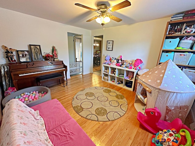 game room featuring ceiling fan and wood-type flooring