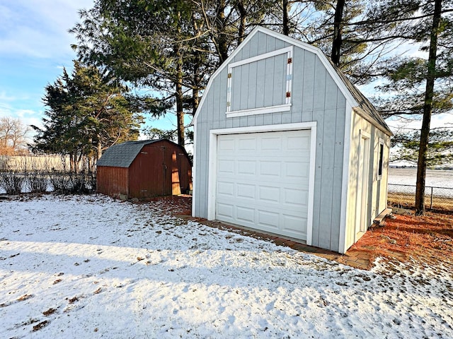 view of snow covered garage