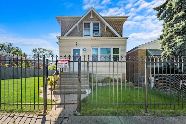 view of front facade featuring a front yard