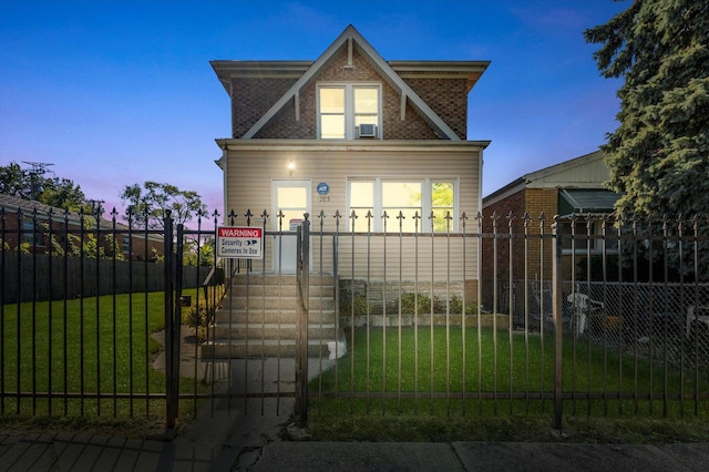 view of front of home with a yard