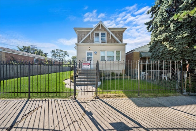 view of front of property with a front lawn