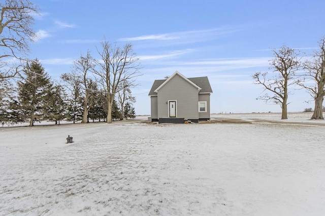 view of snow covered property