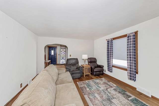 living room with hardwood / wood-style floors