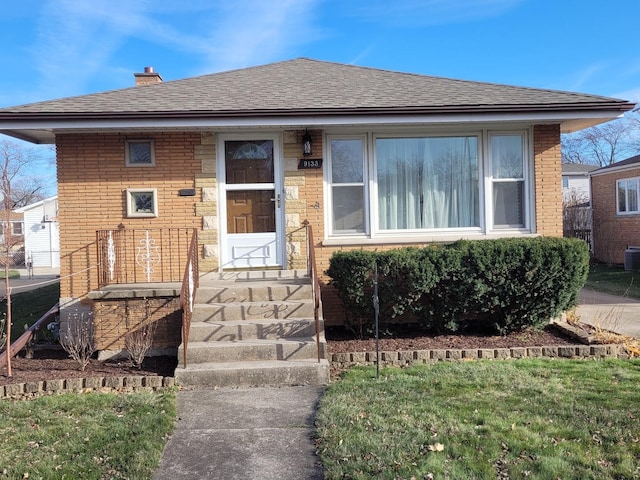 view of front of home with a front yard