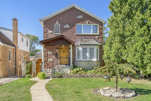 view of front of property with a front yard