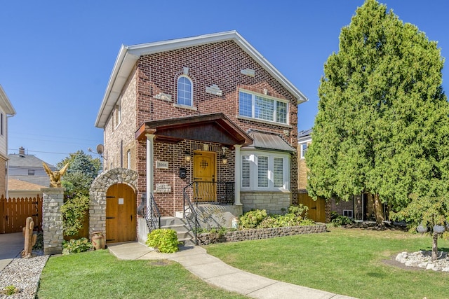 view of front of home with a front lawn