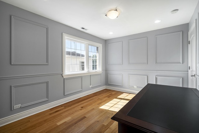 home office featuring light hardwood / wood-style flooring