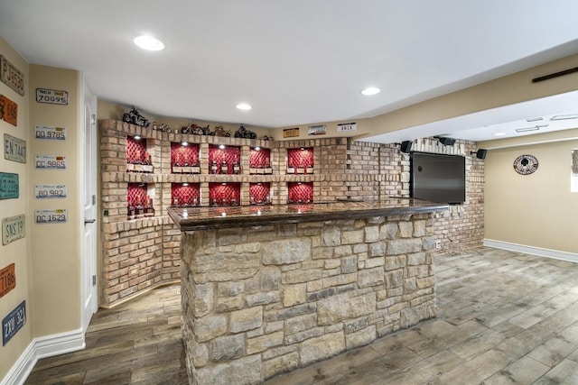 bar featuring wood-type flooring