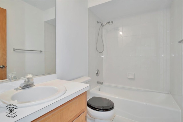 full bathroom with toilet, vanity, and  shower combination