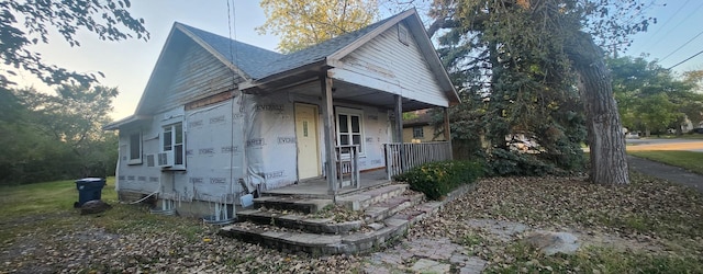 14808 Turlington Ave, Harvey, IL 60426 - view of side of property featuring a porch