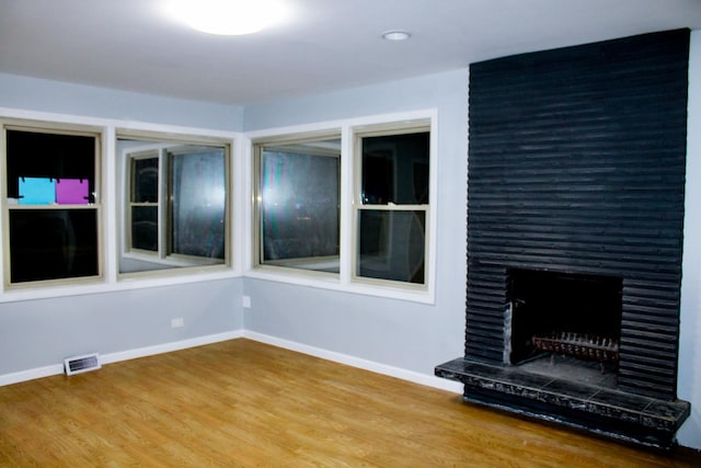 interior space with a large fireplace