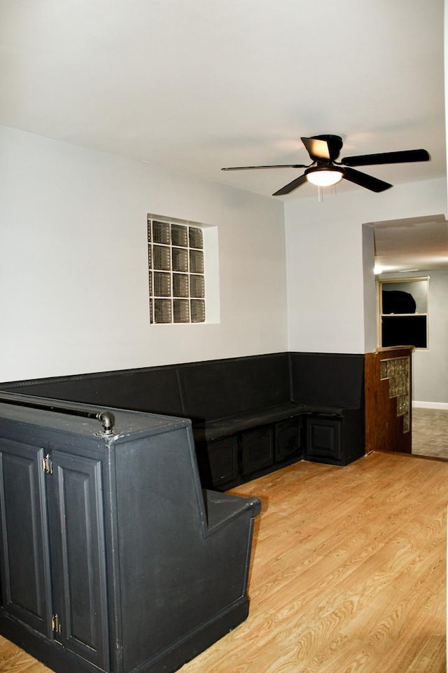 interior space with ceiling fan and light wood-type flooring