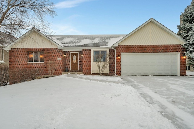 ranch-style home featuring a garage