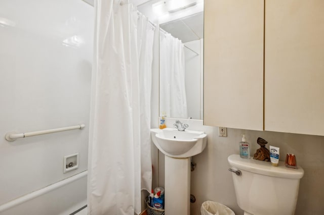 bathroom with sink and toilet