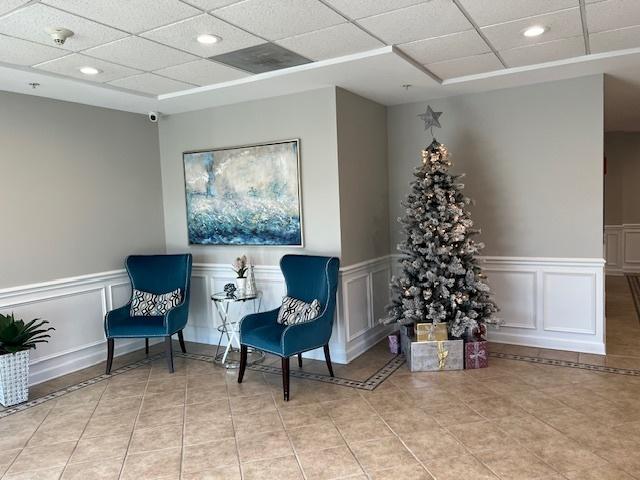 living area featuring light tile patterned floors