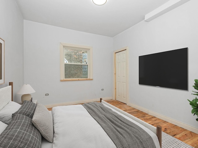 bedroom featuring hardwood / wood-style flooring